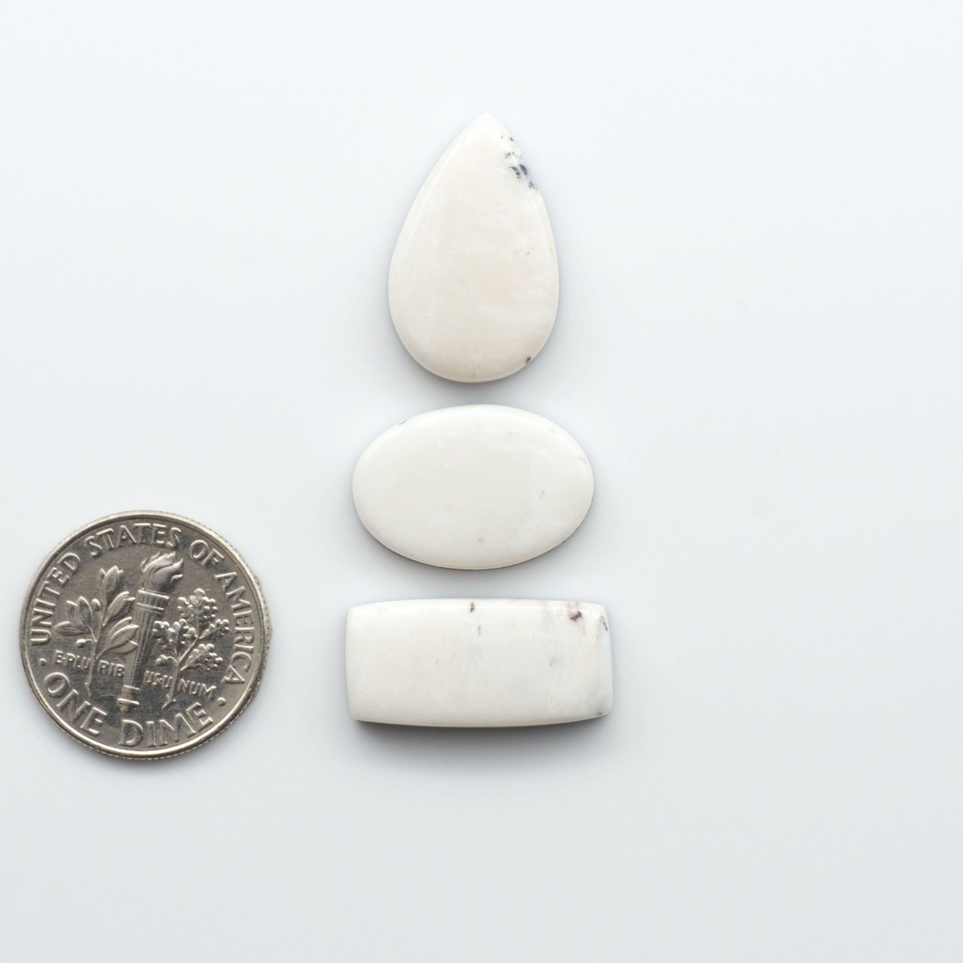 Natural White Buffalo Stone Cabochons are gemstones cut into shapes ideal for jewelry-making and crafting making them an excellent choice for artisans.