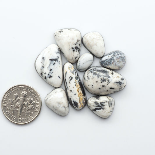 Natural White Buffalo Stone Cabochons are gemstones cut into shapes ideal for jewelry-making and crafting making them an excellent choice for artisans.