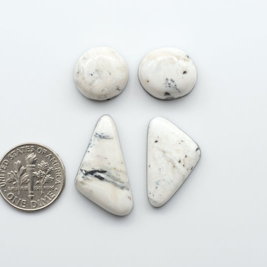 Natural White Buffalo Stone Cabochons are gemstones cut into shapes ideal for jewelry-making and crafting making them an excellent choice for artisans.