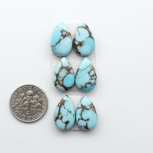 Enhance your jewelry designs with Pressed Turquoise Nugget Cabochons. Crafted from composite materials they add a captivating touch to your creations.