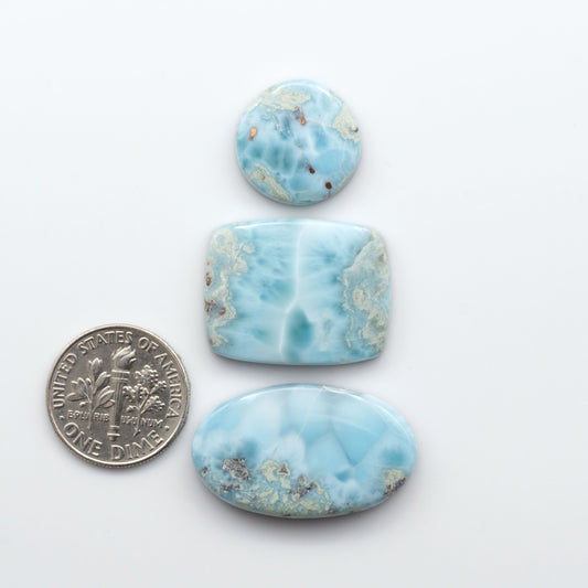 Discover the beauty of Larimar Cabochons. Cut to emphasize the stone's natural patterns and colors. Add a touch of natural beauty to your jewelry designs.