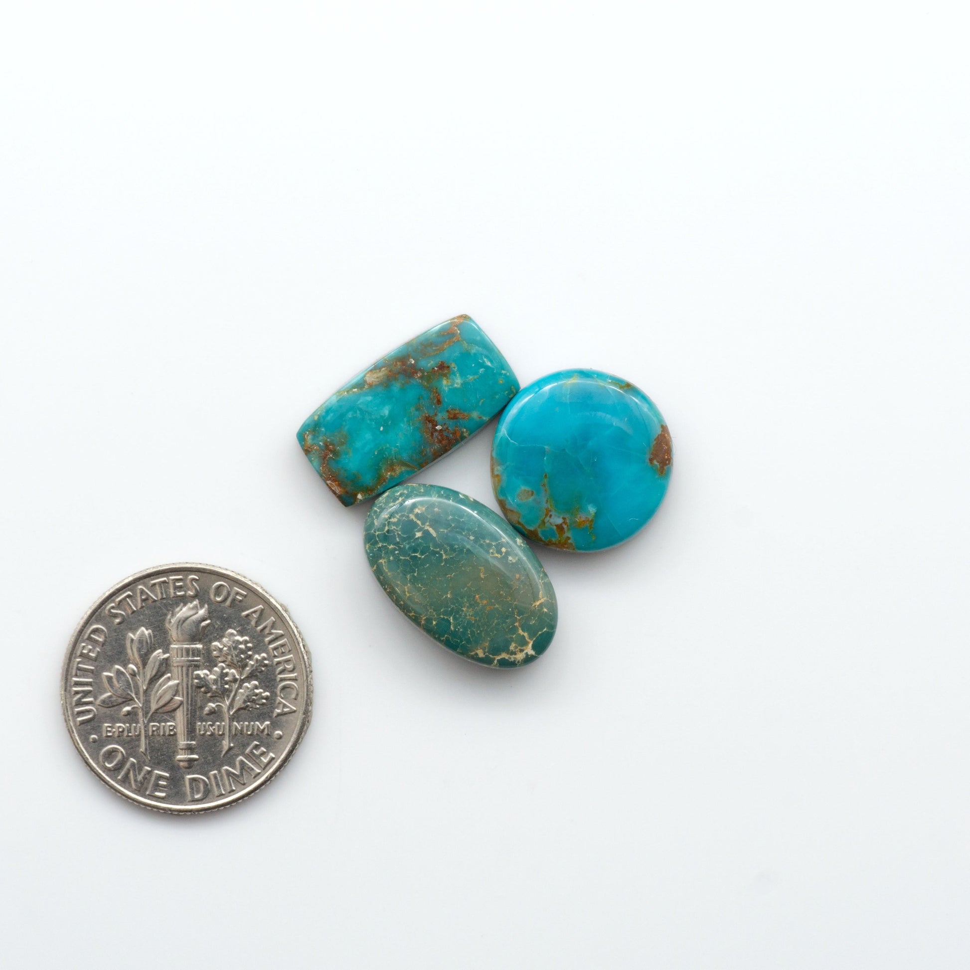 Royston Turquoise cabochons are famous for their distinctive matrix and unique green and blue hues, making them a favored option among jewelry designers.