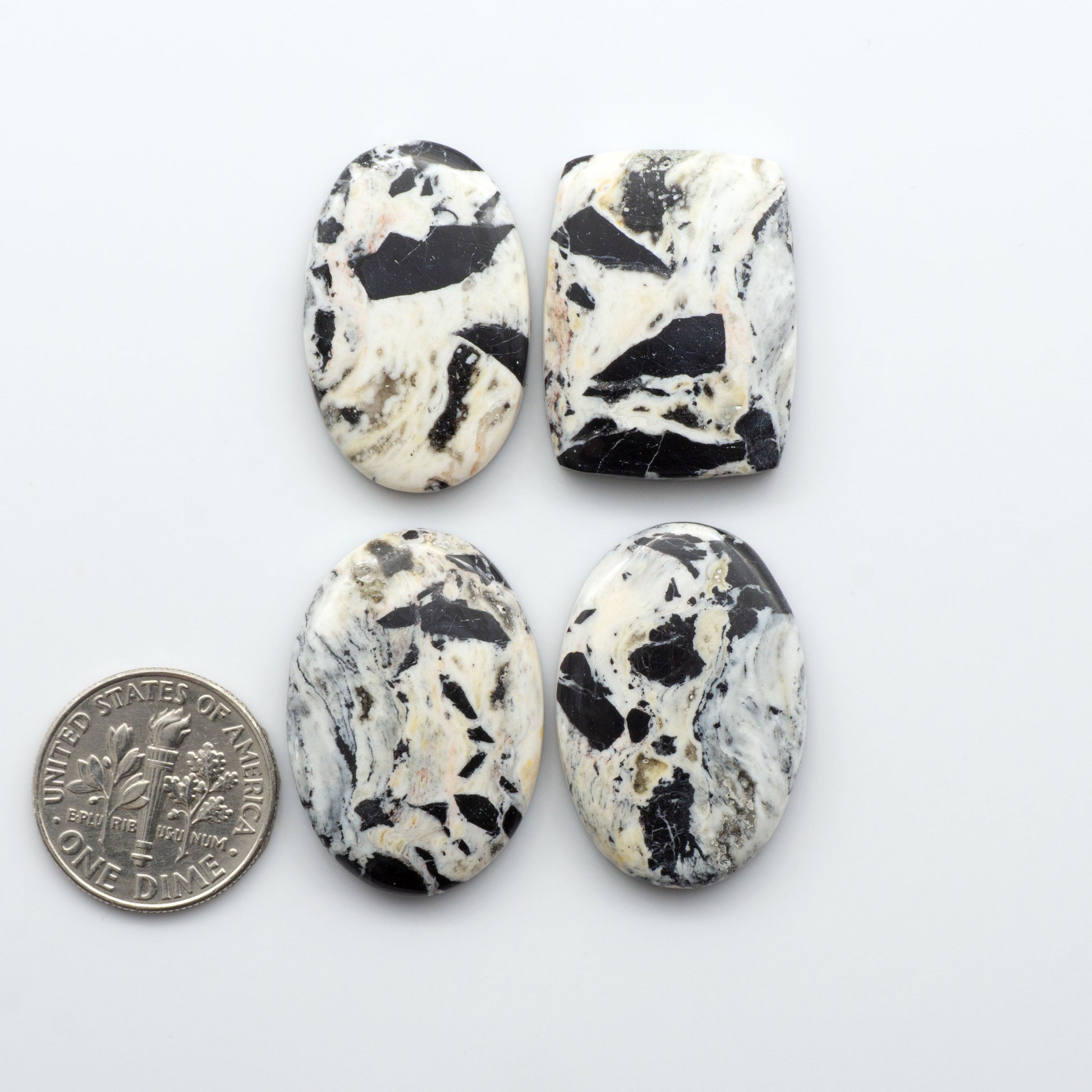 Natural White Buffalo Stone Cabochons are gemstones cut into shapes ideal for jewelry-making and crafting making them an excellent choice for artisans.