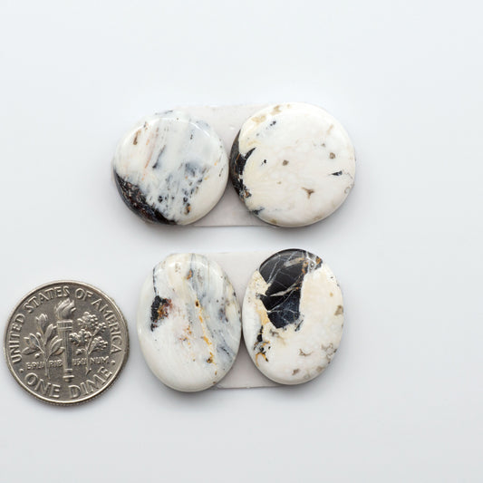 Natural White Buffalo Stone Cabochons are gemstones cut into shapes ideal for jewelry-making and crafting making them an excellent choice for artisans.