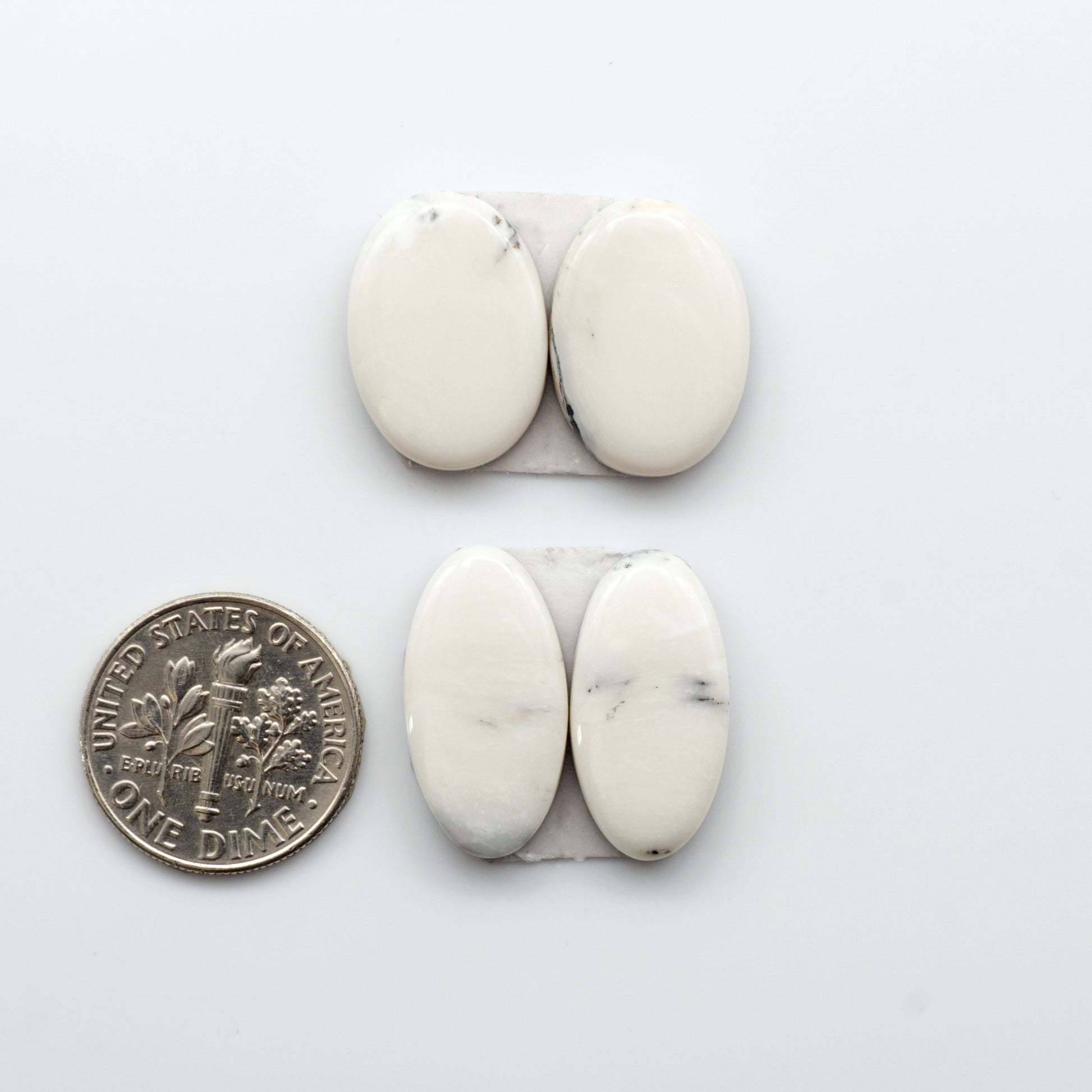 Natural White Buffalo Stone Cabochons are gemstones cut into shapes ideal for jewelry-making and crafting making them an excellent choice for artisans.