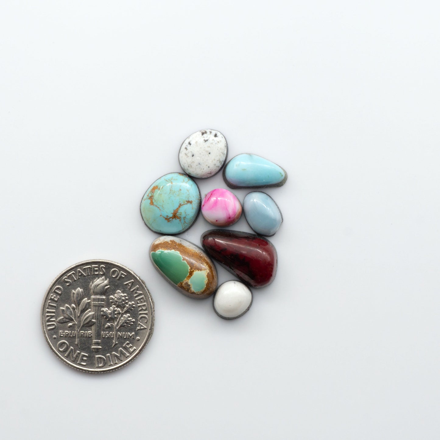 This lot contains an assortment of mixed gemstones. Richly colored and highly varied, these cabochons are sure to have something to excite everyone.