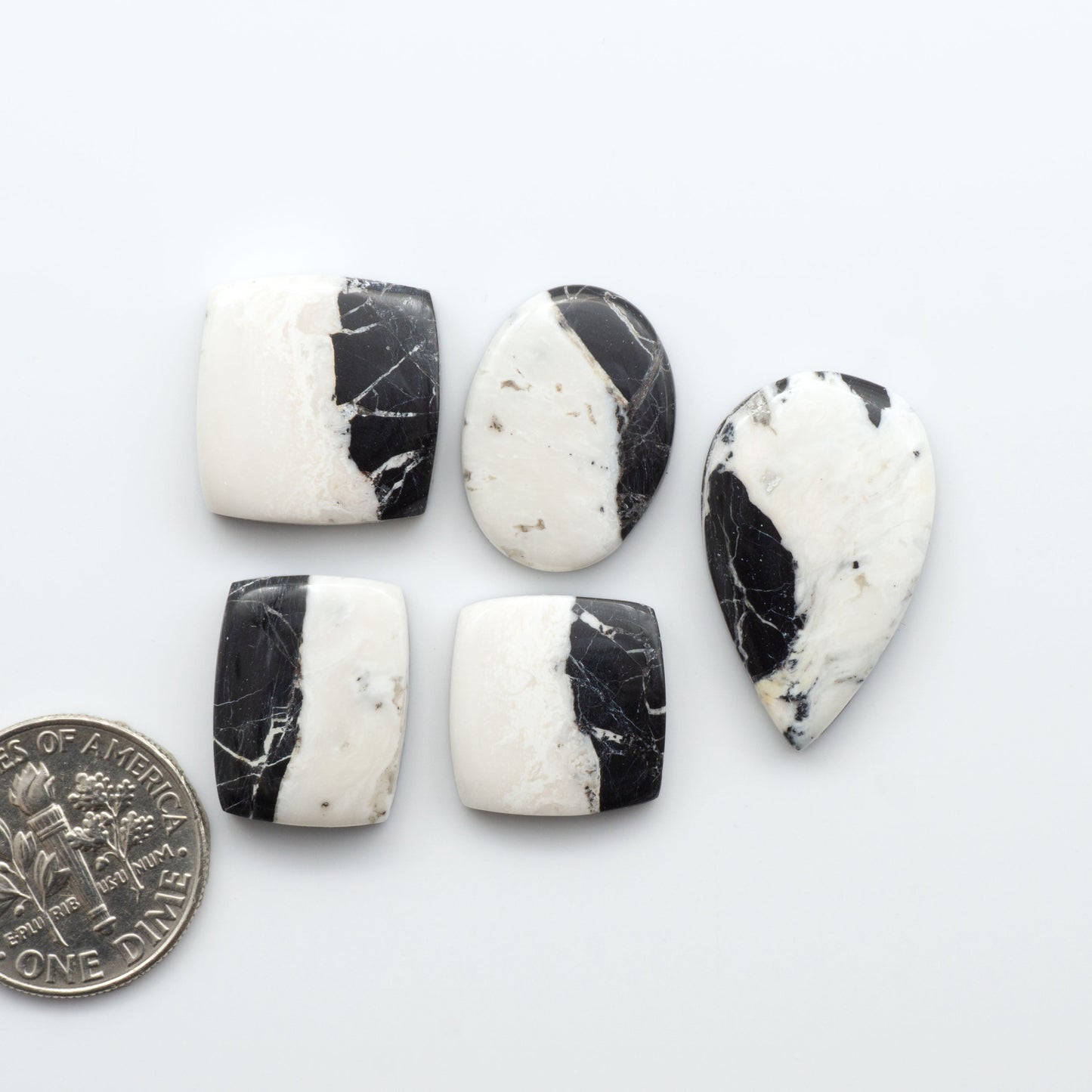 Natural White Buffalo Stone Cabochons are gemstones cut into shapes ideal for jewelry-making and crafting making them an excellent choice for artisans.