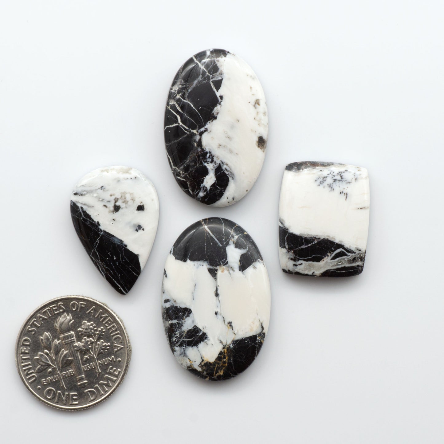 Natural White Buffalo Stone Cabochons are gemstones cut into shapes ideal for jewelry-making and crafting making them an excellent choice for artisans.