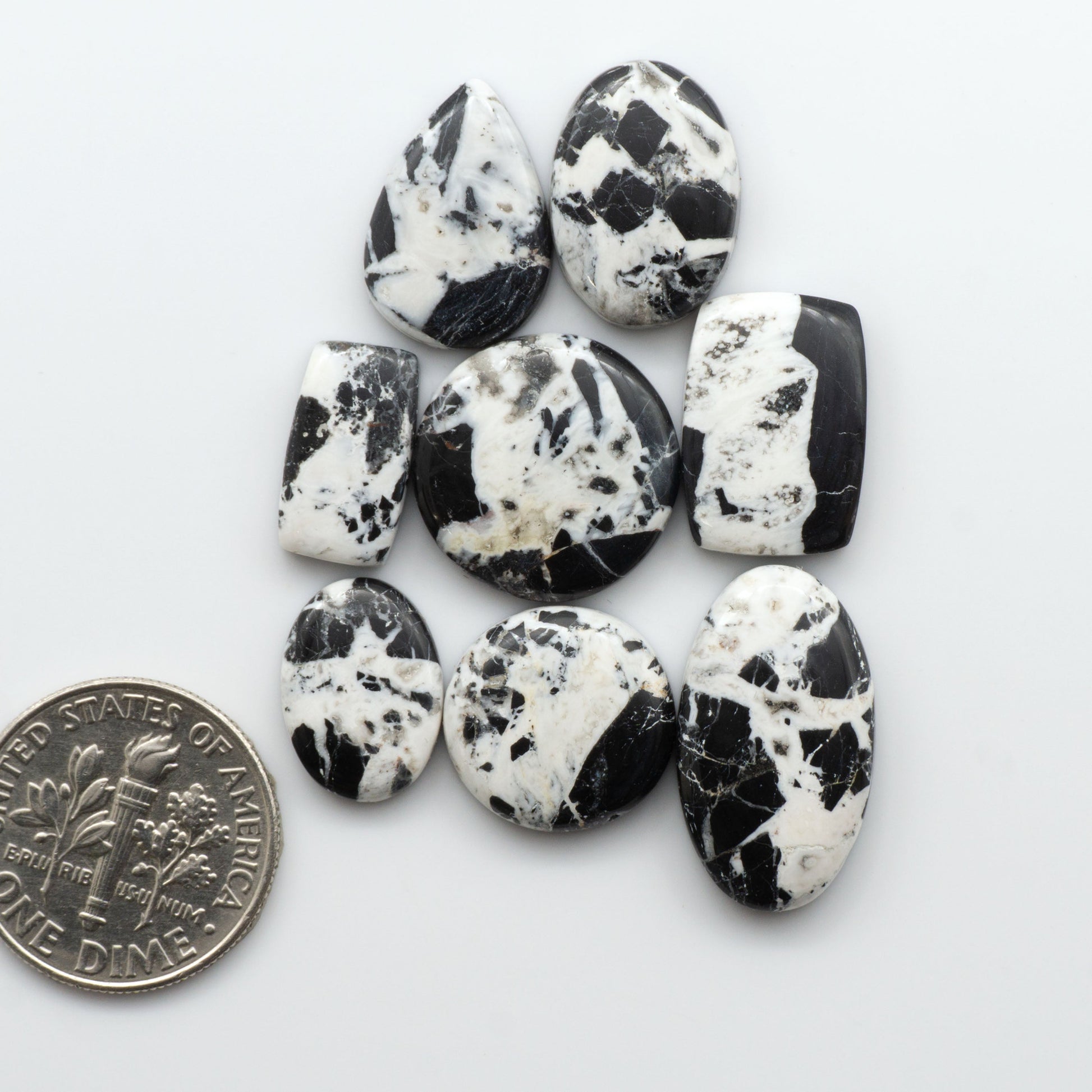 Natural White Buffalo Stone Cabochons are gemstones cut into shapes ideal for jewelry-making and crafting making them an excellent choice for artisans.