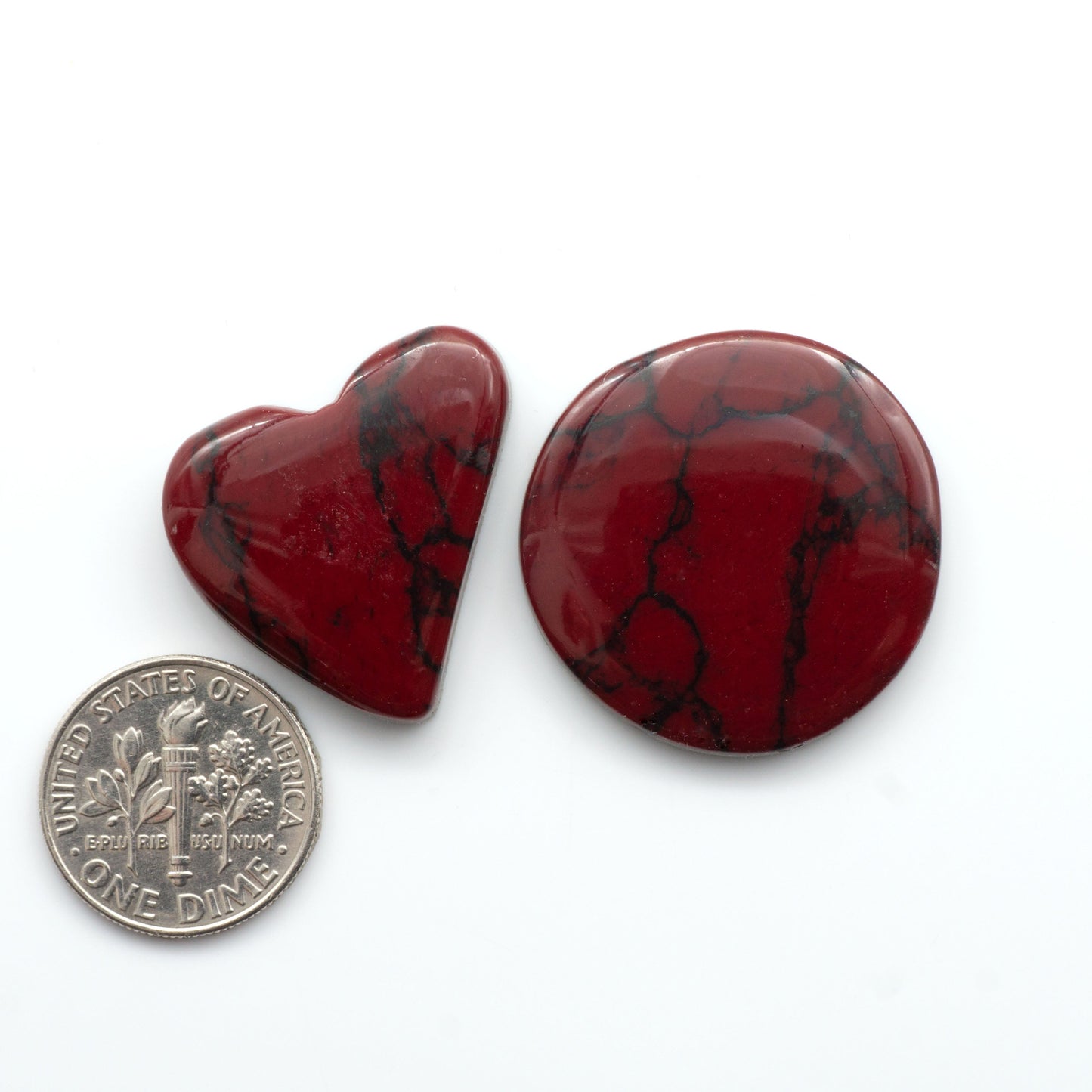 Bloody Bison Jasper is a composite stone with a vibrant red hue and black matrix that creates a strong impression and a touch of opulence to any jewelry piece.