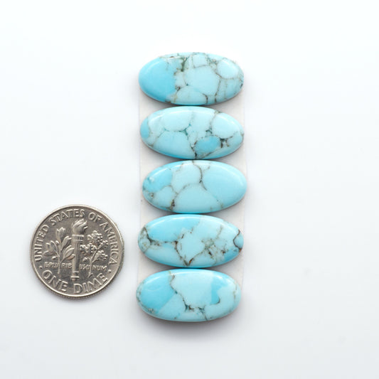 Enhance your jewelry designs with Pressed Turquoise Nugget Cabochons. Crafted from composite materials they add a captivating touch to your creations.