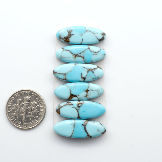 Enhance your jewelry designs with Pressed Turquoise Nugget Cabochons. Crafted from composite materials they add a captivating touch to your creations.