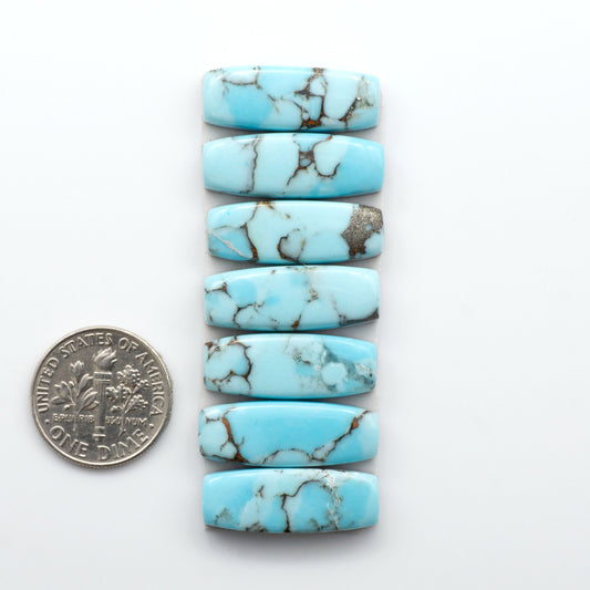 Enhance your jewelry designs with Pressed Turquoise Nugget Cabochons. Crafted from composite materials they add a captivating touch to your creations.