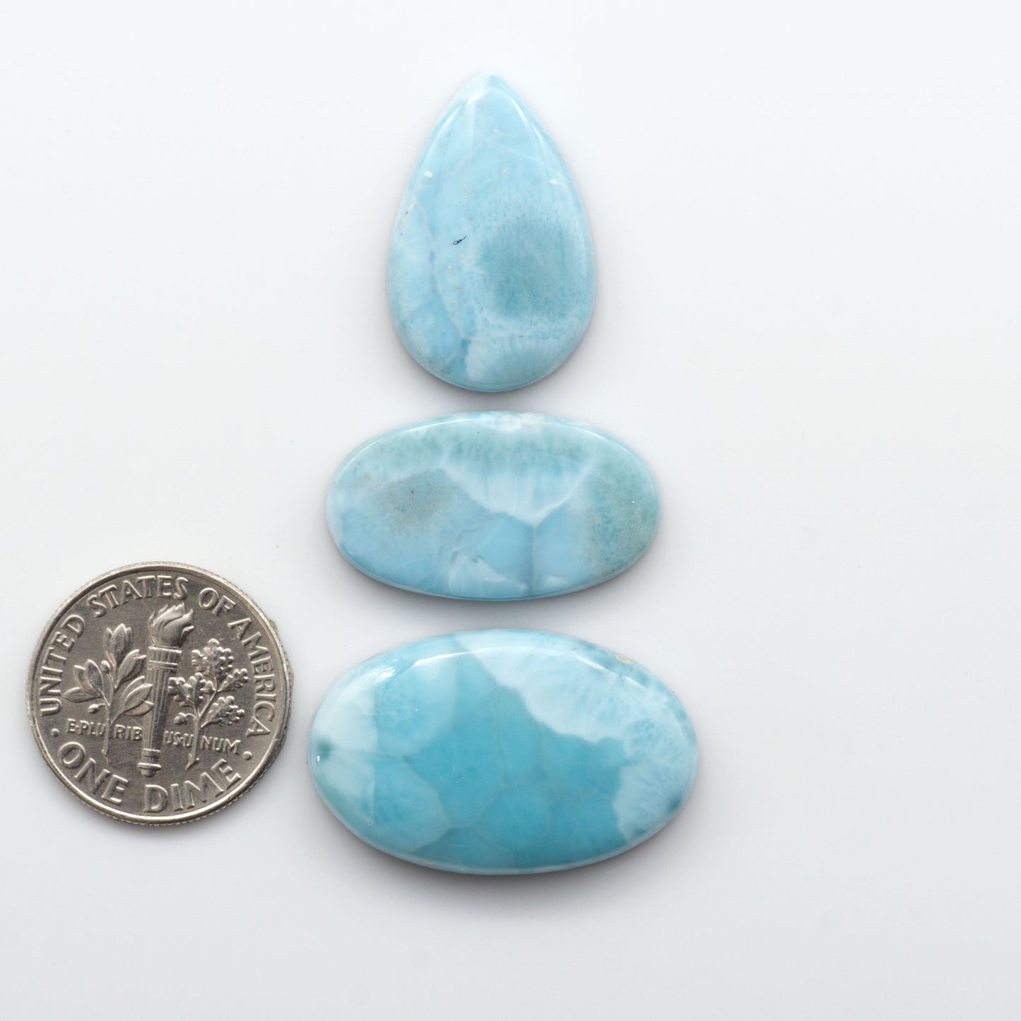 Discover the beauty of Larimar Cabochons. Cut to emphasize the stone's natural patterns and colors. Add a touch of natural beauty to your jewelry designs.