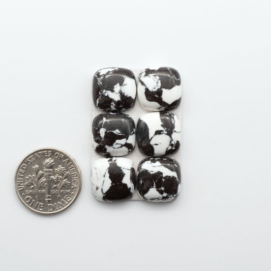 These White Buffalo Cabochons are expertly cut and polished from composite material, resulting in a stunning and long-lasting gemstone.

