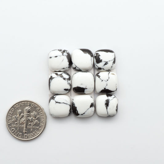 These White Buffalo Cabochons are expertly cut and polished from composite material, resulting in a stunning and long-lasting gemstone.

