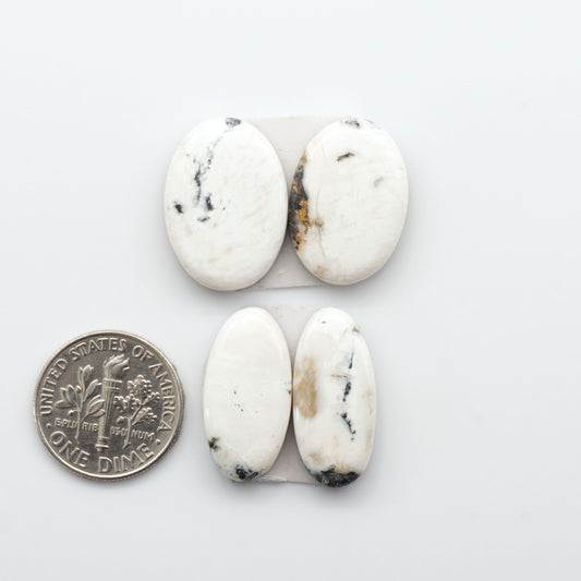 Natural White Buffalo Stone Cabochons are semi-precious gemstones cut into shapes ideal for jewelry-making, making them an excellent choice for artisans.