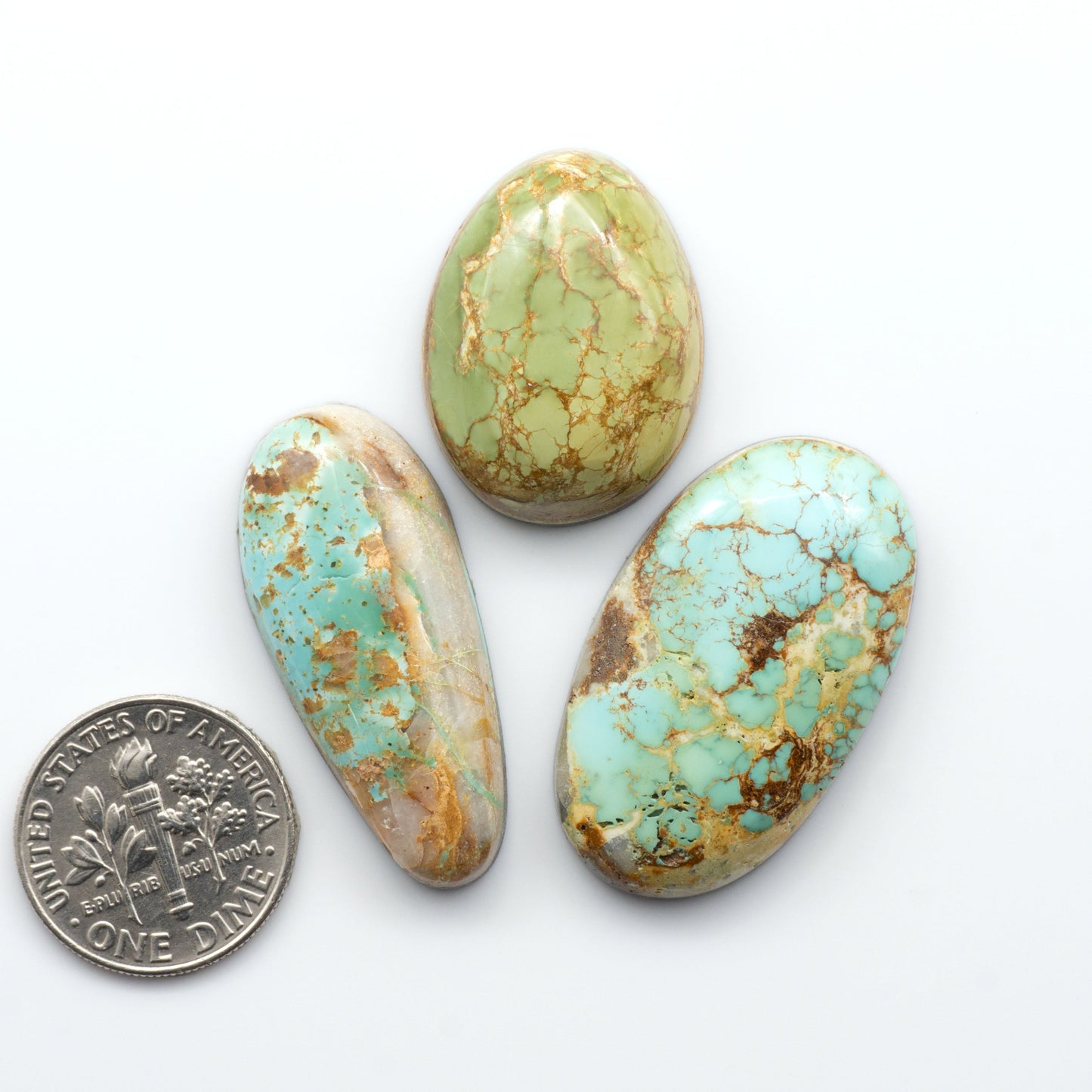 Royston Turquoise cabochons are famous for their distinctive matrix and unique green and blue hues, making them a favored option among jewelry designers.