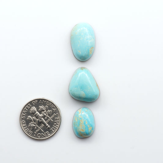 Royston Turquoise cabochons are famous for their distinctive matrix and unique green and blue hues, making them a favored option among jewelry designers.