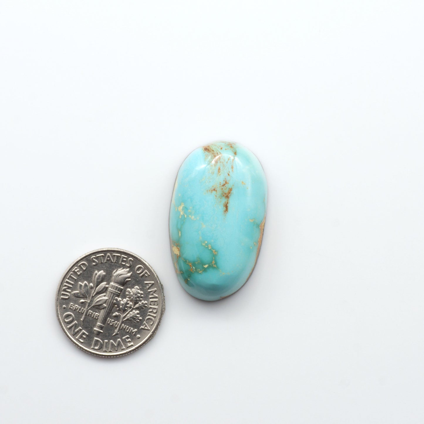 Royston Turquoise cabochons are famous for their distinctive matrix and unique green and blue hues, making them a favored option among jewelry designers.