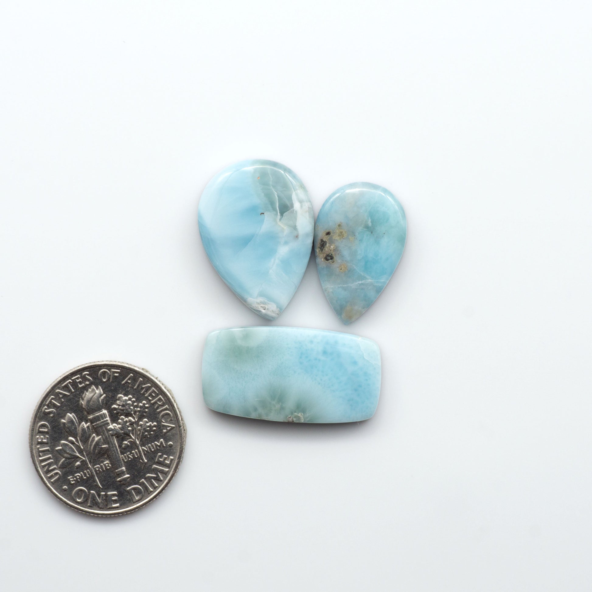 Discover the beauty of Larimar Cabochons. Cut to emphasize the stone's natural patterns and colors. Add a touch of natural beauty to your jewelry designs.