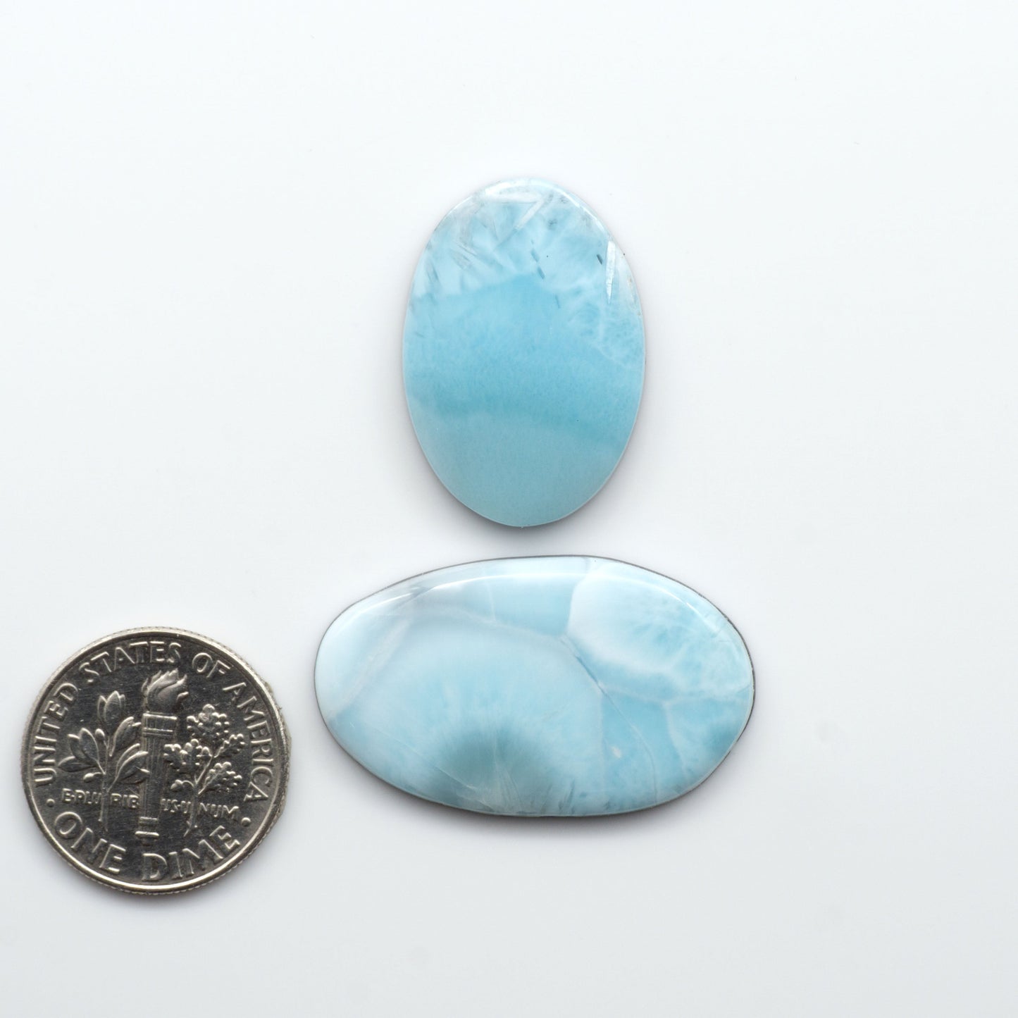 Discover the beauty of Larimar Cabochons. Cut to emphasize the stone's natural patterns and colors. Add a touch of natural beauty to your jewelry designs.