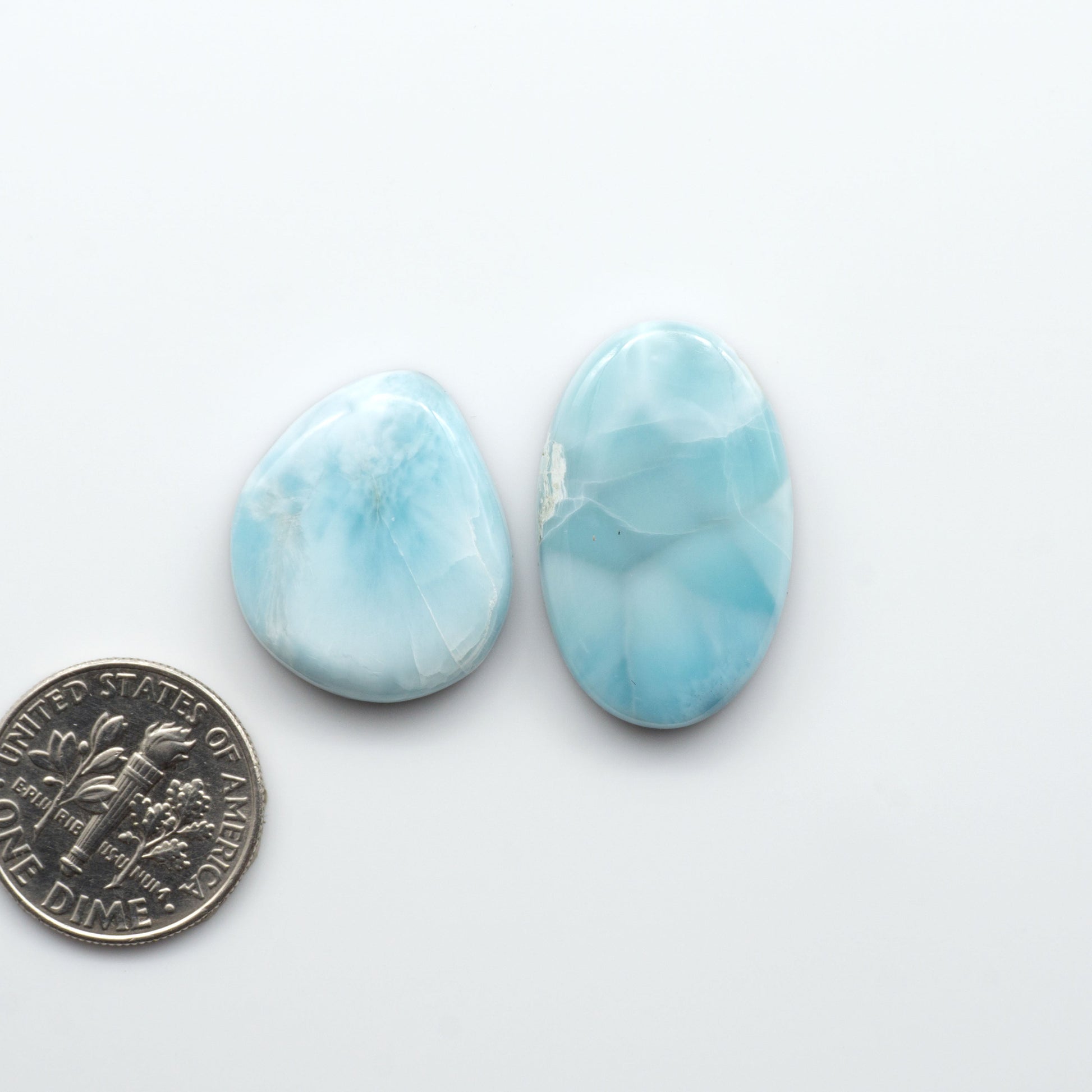 Discover the beauty of Larimar Cabochons. Cut to emphasize the stone's natural patterns and colors. Add a touch of natural beauty to your jewelry designs.