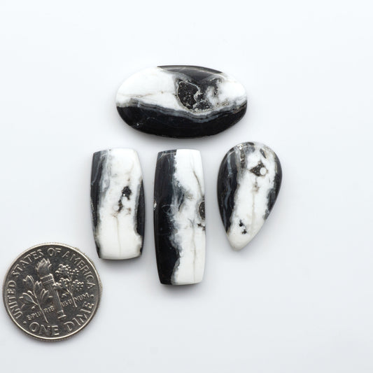 Natural White Buffalo Stone Cabochons are semi-precious gemstones cut into shapes ideal for jewelry-making, making them an excellent choice for artisans.