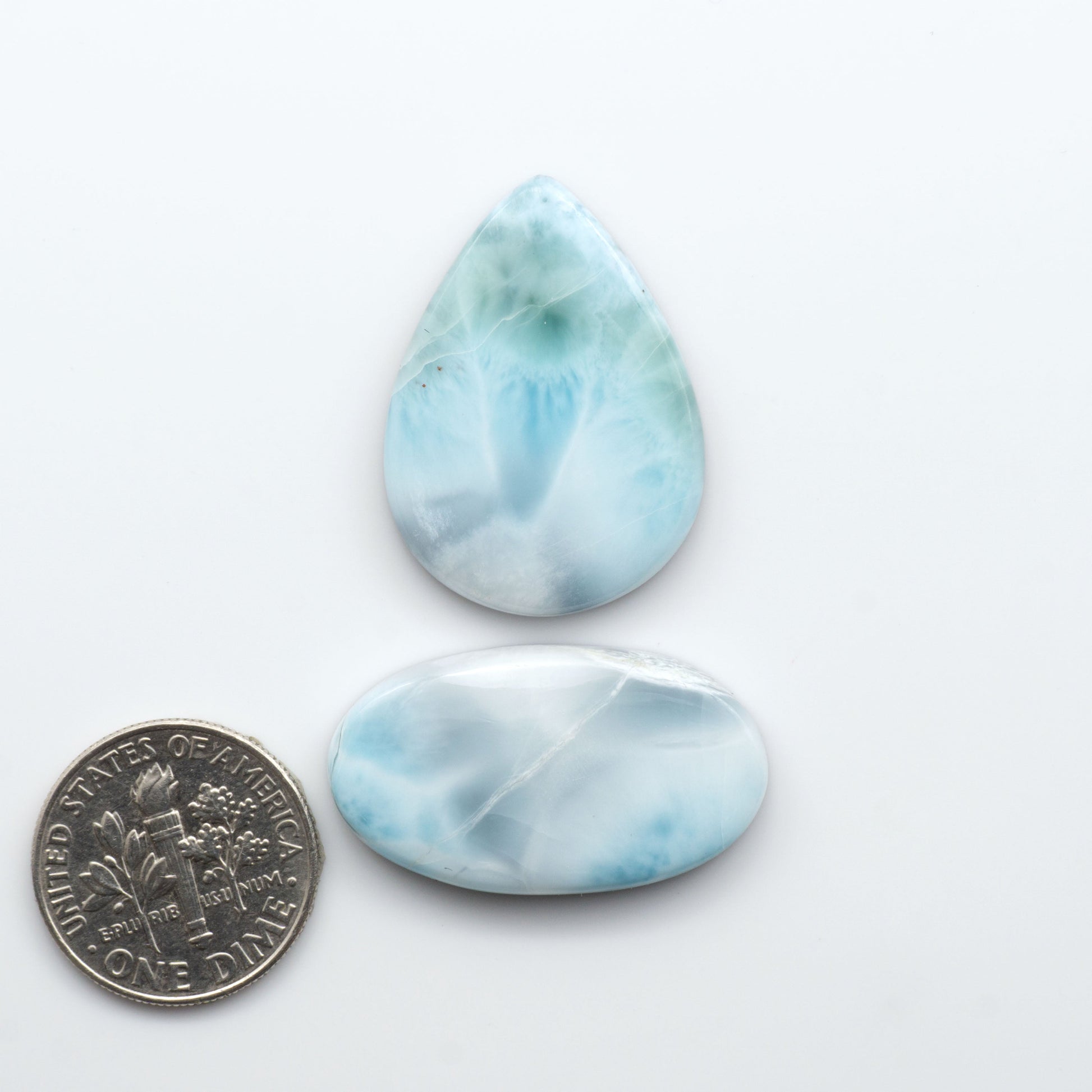 Discover the beauty of Larimar Cabochons. Cut to emphasize the stone's natural patterns and colors. Add a touch of natural beauty to your jewelry designs.