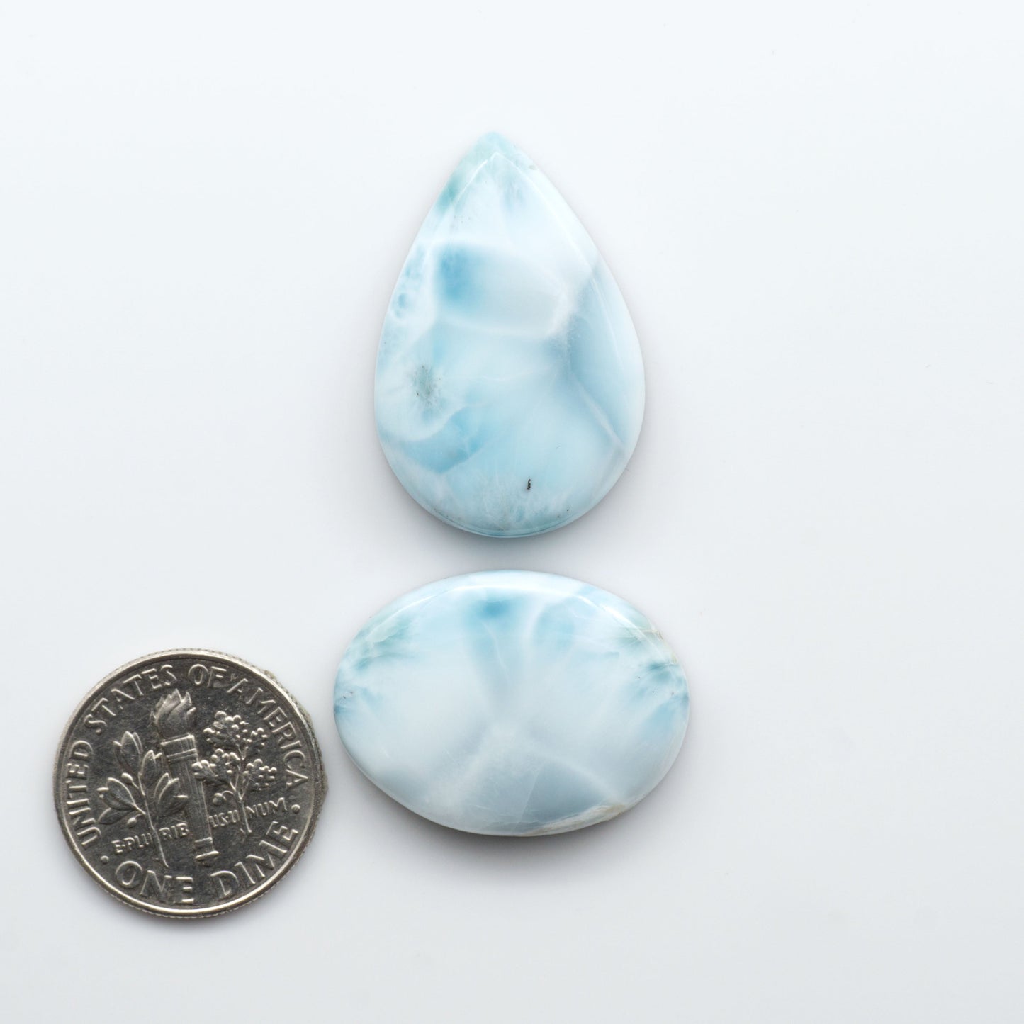 Discover the beauty of Larimar Cabochons. Cut to emphasize the stone's natural patterns and colors. Add a touch of natural beauty to your jewelry designs.