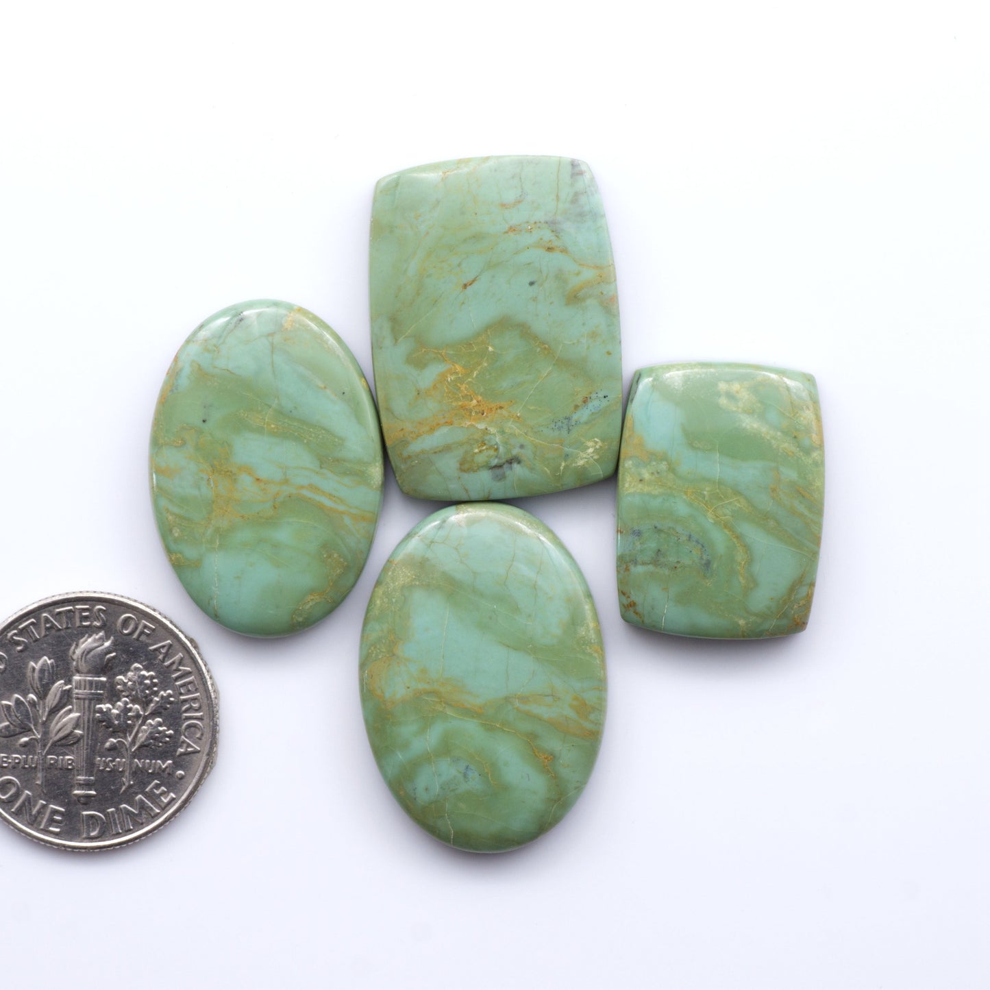 Experience the beauty of Turquoise Mountain Cabochons. With their distinctive blue and green color, these gemstones are perfect for any jewelry piece.