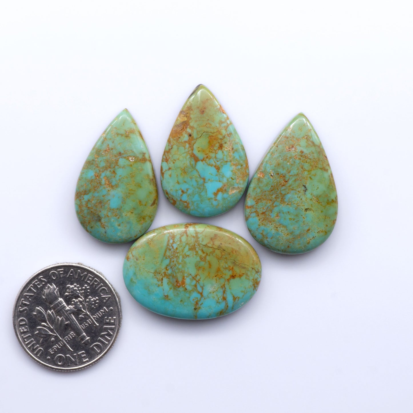 Experience the beauty of Turquoise Mountain Cabochons. With their distinctive blue and green color, these gemstones are perfect for any jewelry piece.