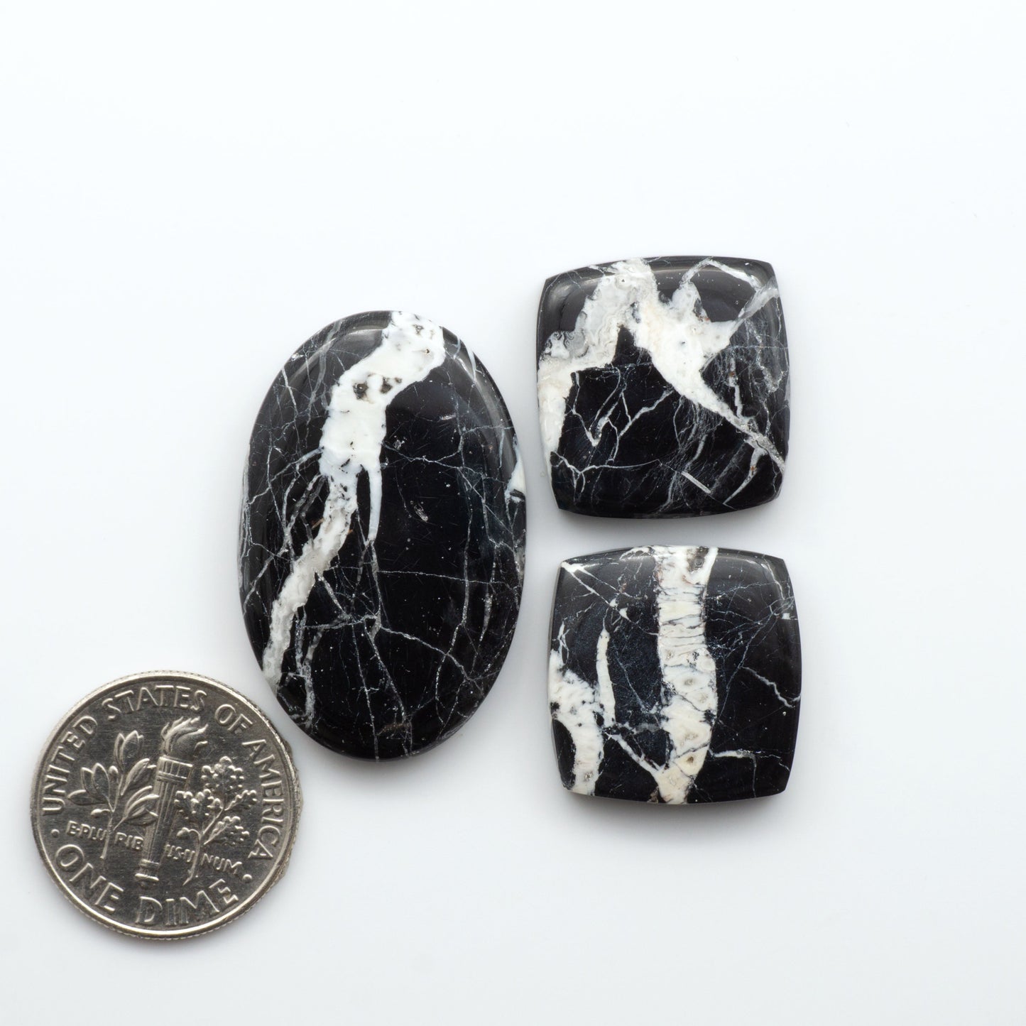 Natural White Buffalo Stone Cabochons are semi-precious gemstones cut into shapes ideal for jewelry-making, making them an excellent choice for artisans.