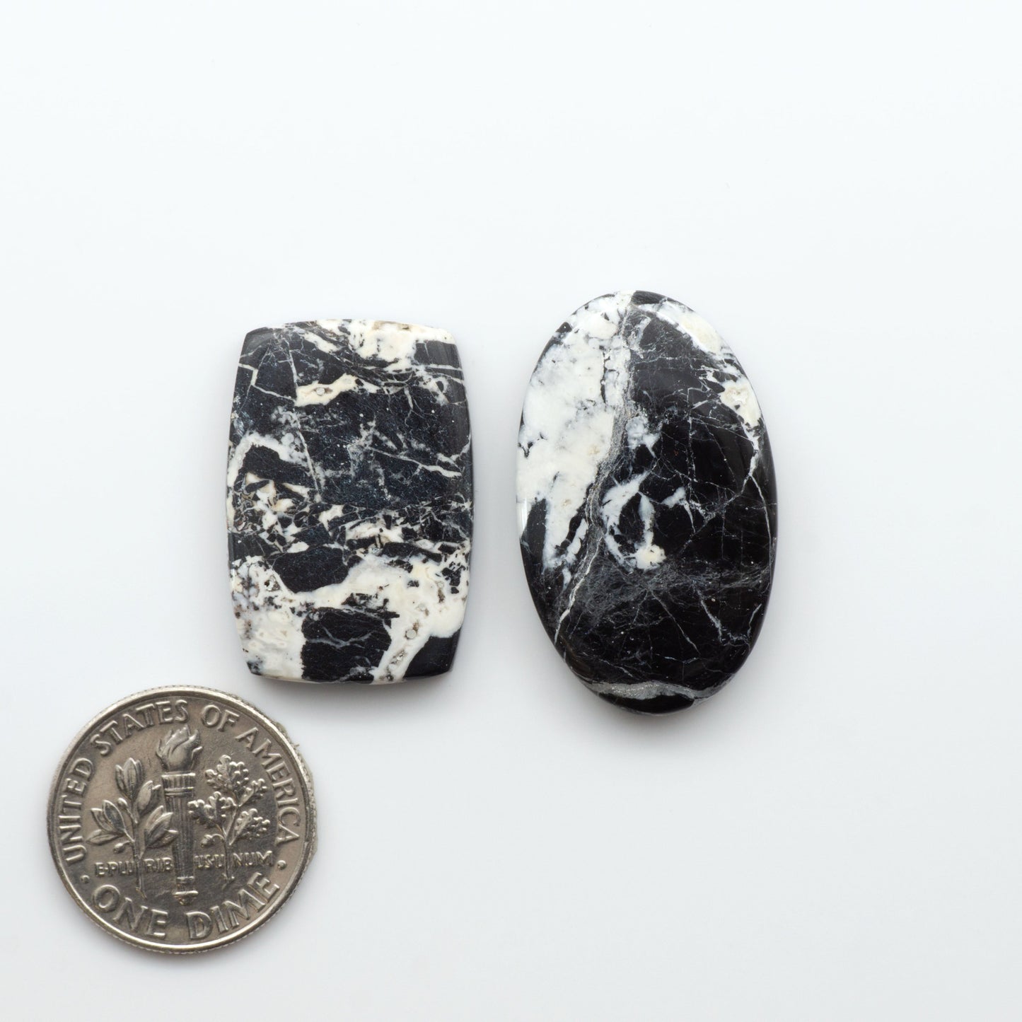 Natural White Buffalo Stone Cabochons are semi-precious gemstones cut into shapes ideal for jewelry-making, making them an excellent choice for artisans.