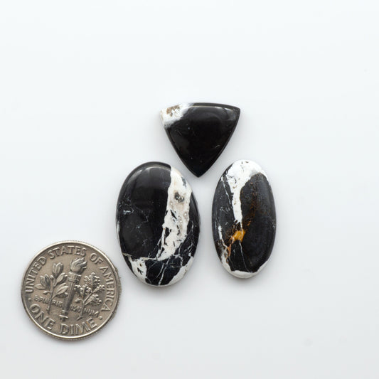 Natural White Buffalo Stone Cabochons are semi-precious gemstones cut into shapes ideal for jewelry-making, making them an excellent choice for artisans.