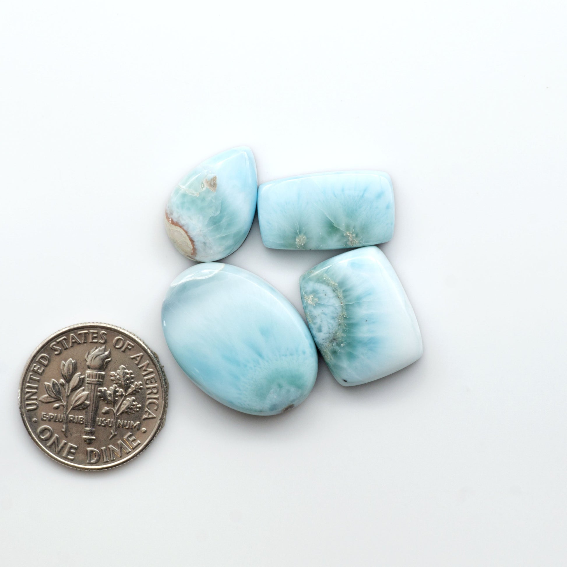 Discover the beauty of Larimar Cabochons. Cut to emphasize the stone's natural patterns and colors. Add a touch of natural beauty to your jewelry designs.