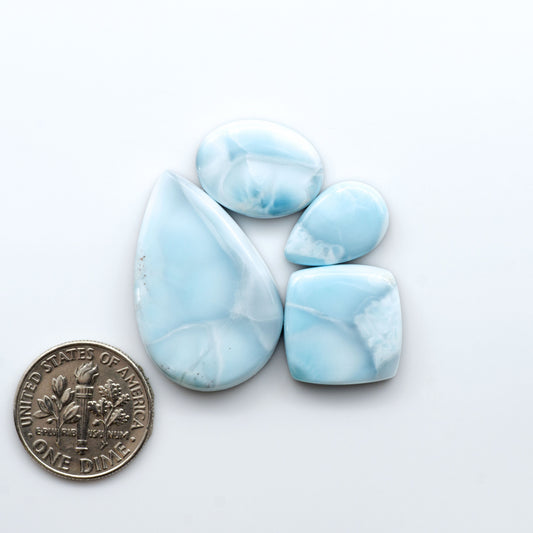 Discover the beauty of Larimar Cabochons. Cut to emphasize the stone's natural patterns and colors. Add a touch of natural beauty to your jewelry designs.