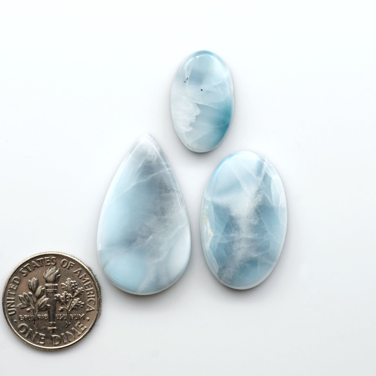 Discover the beauty of Larimar Cabochons. Cut to emphasize the stone's natural patterns and colors. Add a touch of natural beauty to your jewelry designs.