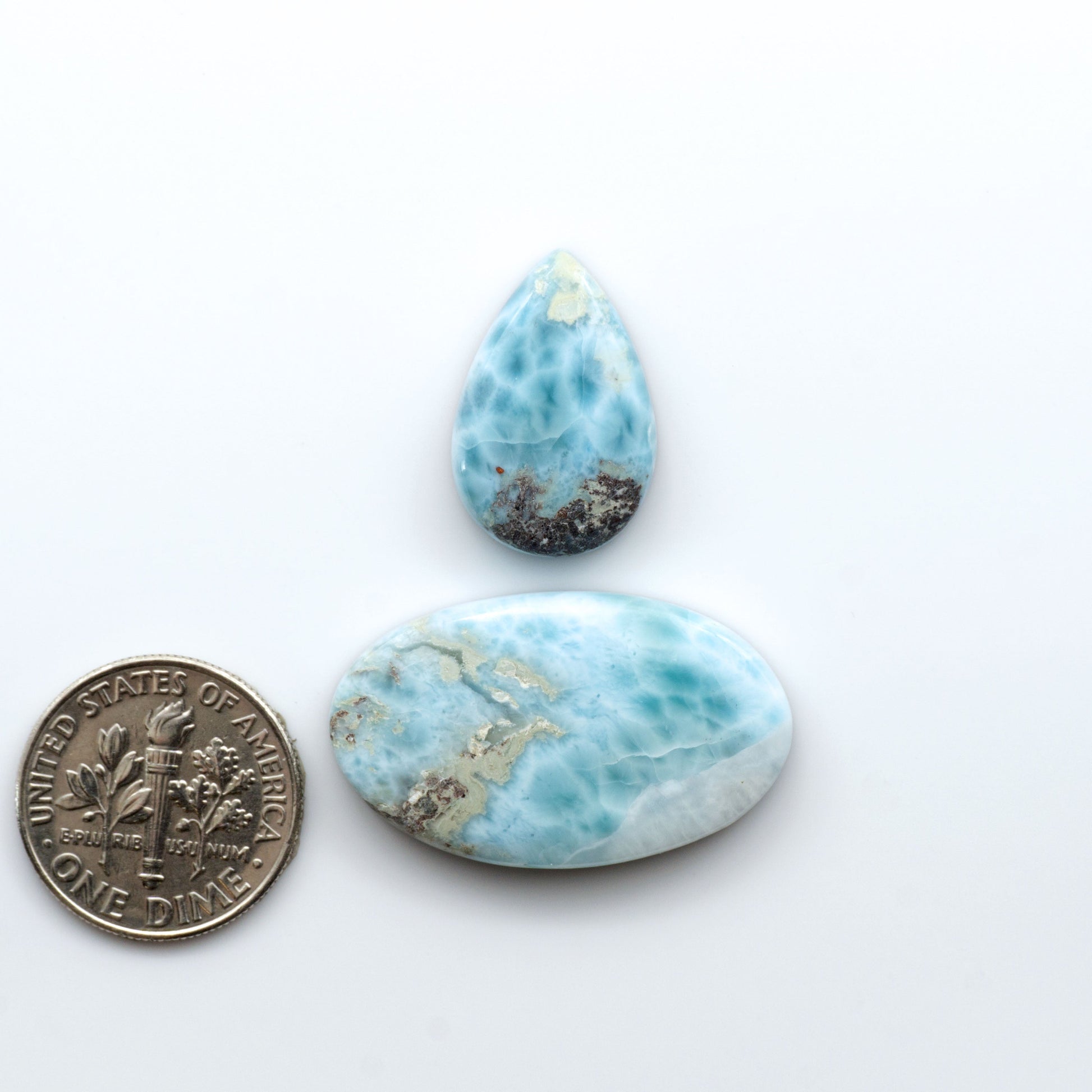 Discover the beauty of Larimar Cabochons. Cut to emphasize the stone's natural patterns and colors. Add a touch of natural beauty to your jewelry designs.