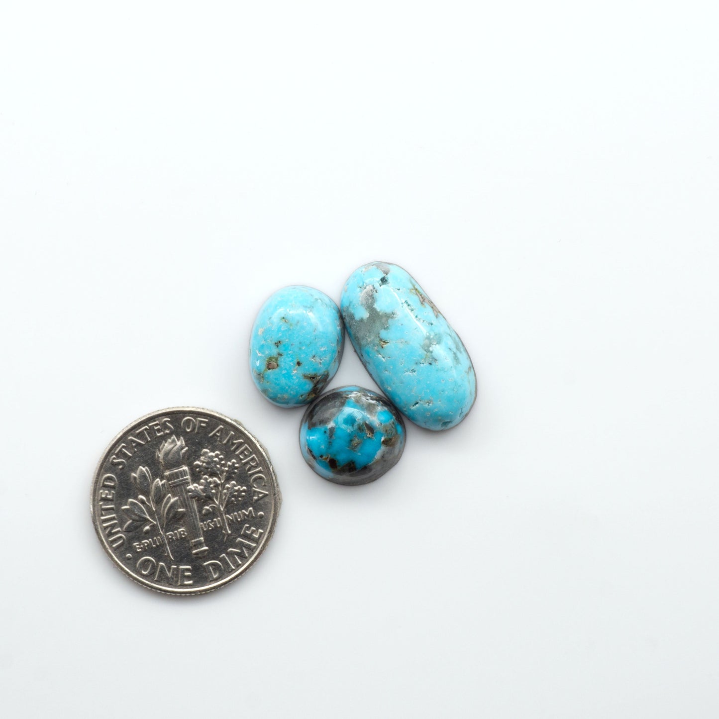 Nacozari turquoise cabochons are striking gemstones known for their vibrant blue to greenish-blue colors, stones are prized in jewelry making.