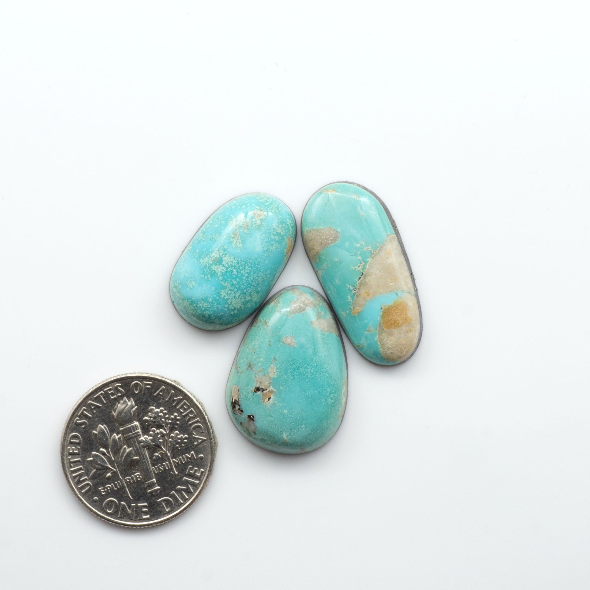 Nacozari turquoise cabochons are striking gemstones known for their vibrant blue to greenish-blue colors, stones are prized in jewelry making.