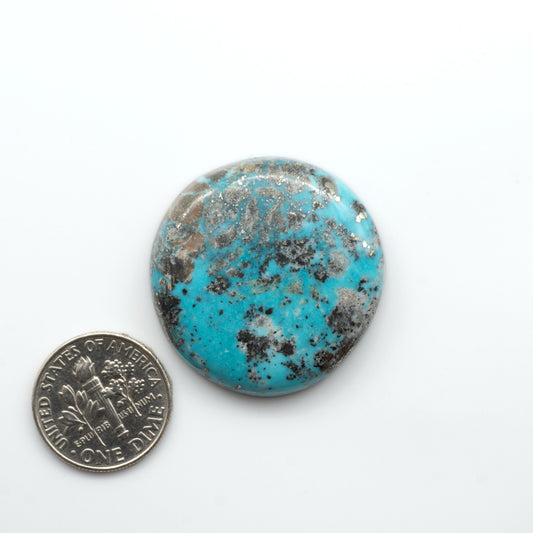 Nacozari turquoise cabochons are striking gemstones known for their vibrant blue to greenish-blue colors and pyrite, these stones are prized in jewelry making.