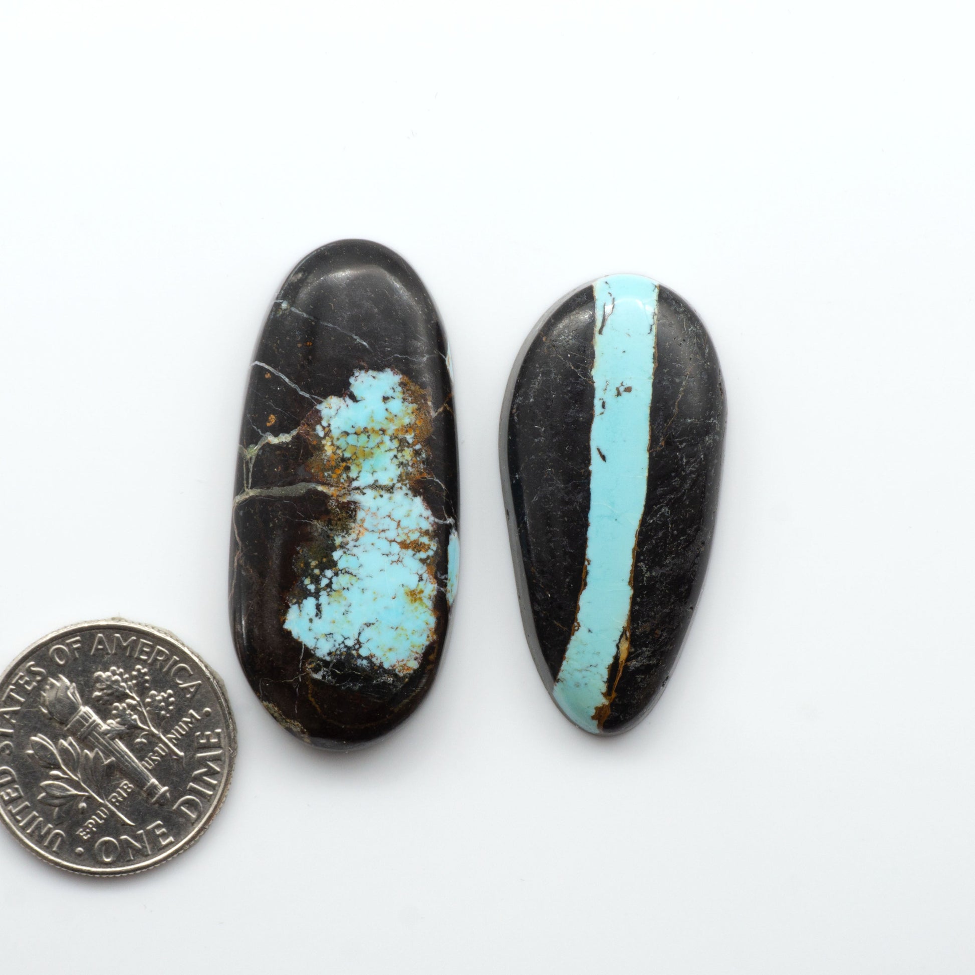 Natural Black Jack Turquoise features a bold black color with striking veins of turquoise, making it a truly one-of-a-kind addition to your jewelry collection. 