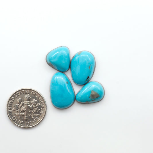 Nacozari turquoise cabochons are striking gemstones known for their vibrant blue to greenish-blue colors and pyrite, these stones are prized in jewelry making.