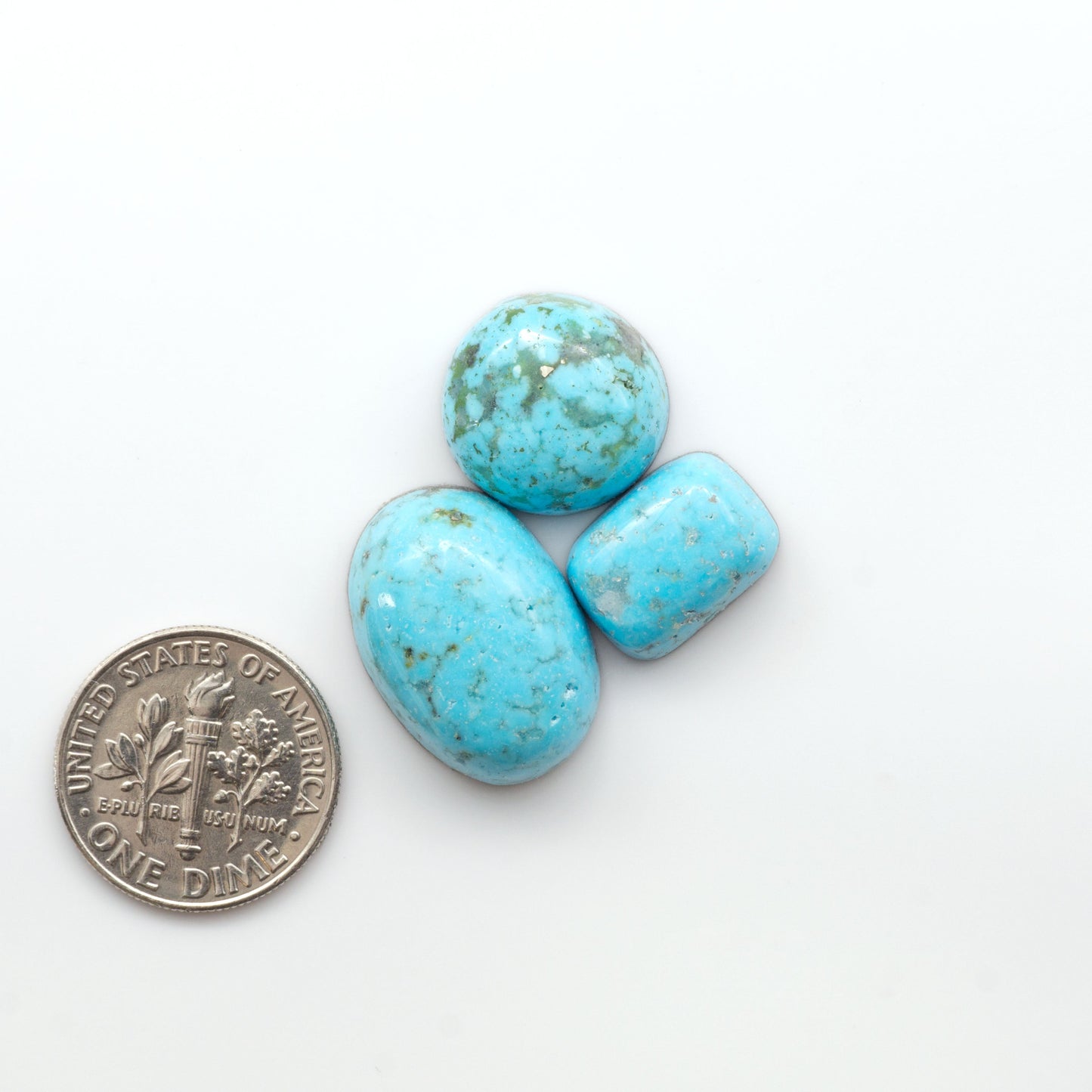 Nacozari turquoise cabochons are striking gemstones known for their vibrant blue to greenish-blue colors and pyrite, these stones are prized in jewelry making.