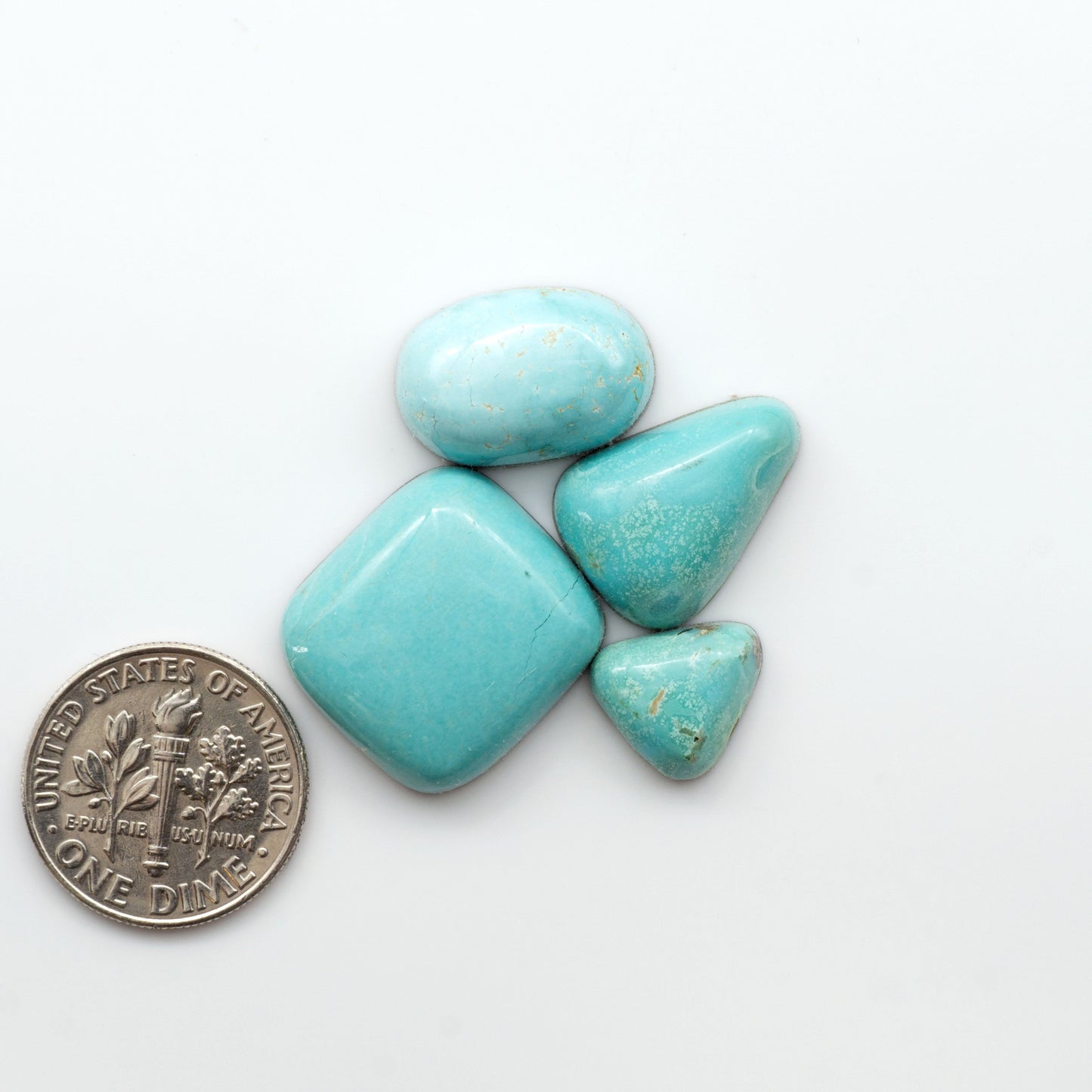 Nacozari turquoise cabochons are striking gemstones known for their vibrant blue to greenish-blue colors and pyrite, these stones are prized in jewelry making.